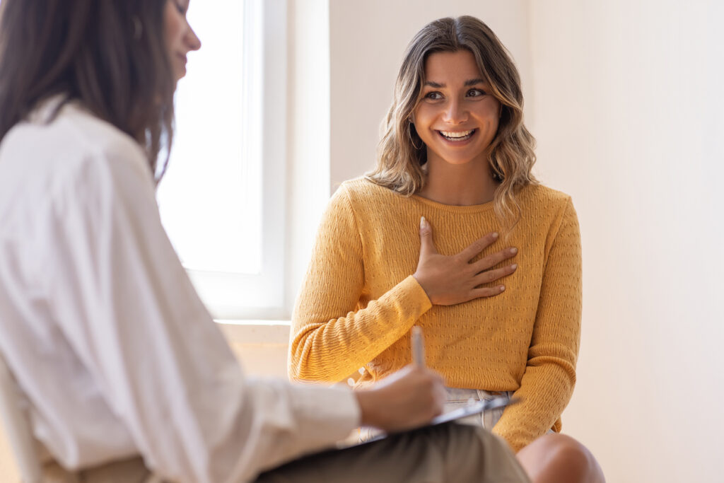 Psychologist listening to her patient